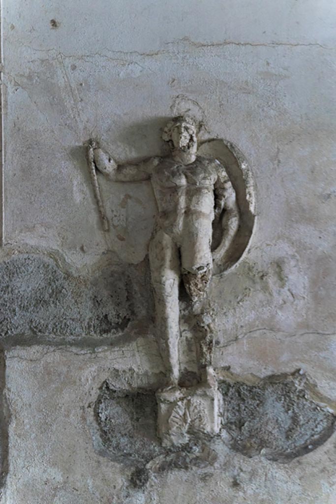 Herculaneum Suburban Baths. October 2023. 
Tepidarium, stucco warrior from north end of east wall. Photo courtesy of Johannes Eber.